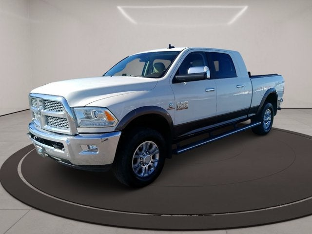 2018 RAM 3500 Laramie in Pearl White — front three-quarter view