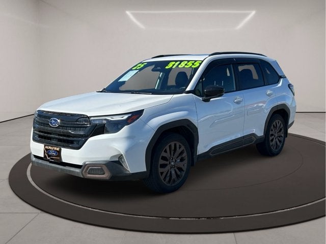 2025 Subaru Forester Sport in Crystal White Pearl — front three-quarter view